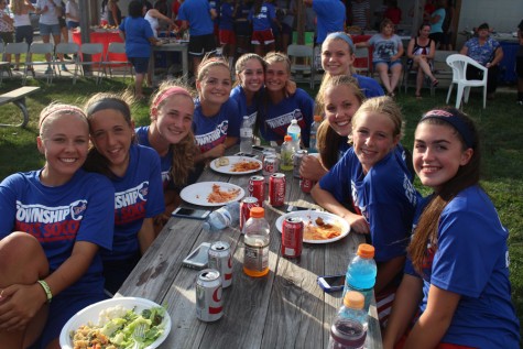 Soccer players enjoy the comraderie at the first pasta party.