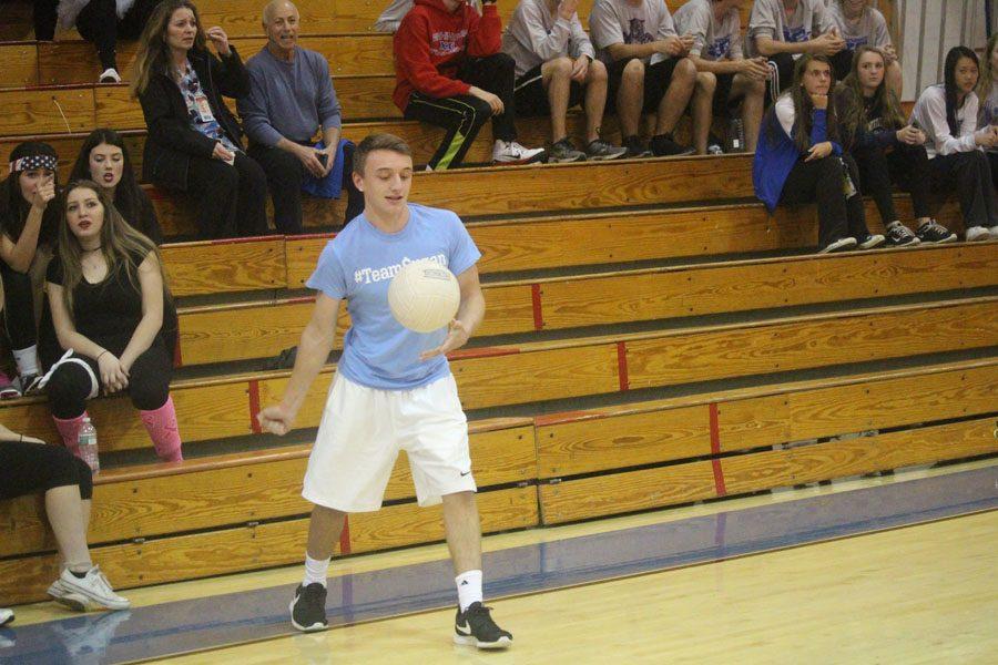 Mike Melfi 17 serving the volley.