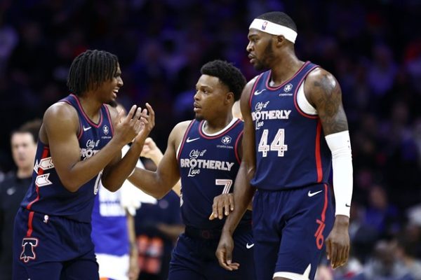 Newest Sixer Kyle Lowry talks with teammates Tyrese Maxey and Paul Reed. Photo courtesy of Libertyballers.com

