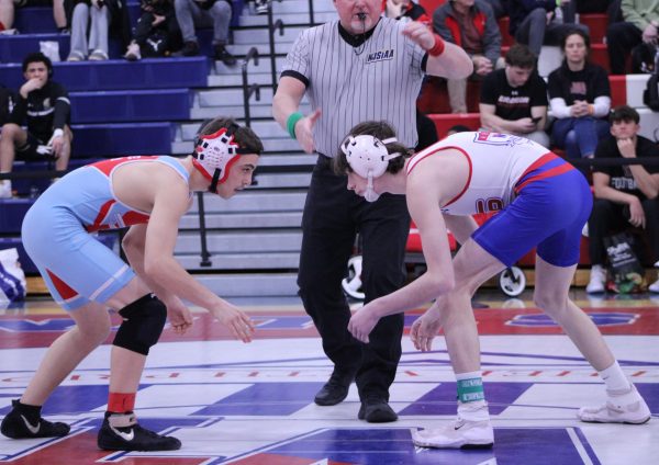Photo courtesy of Nichole Hoopes
WTHS Varsity wrestler Cole Hagerty prepares to begin a match at the district 30 tournament. 
